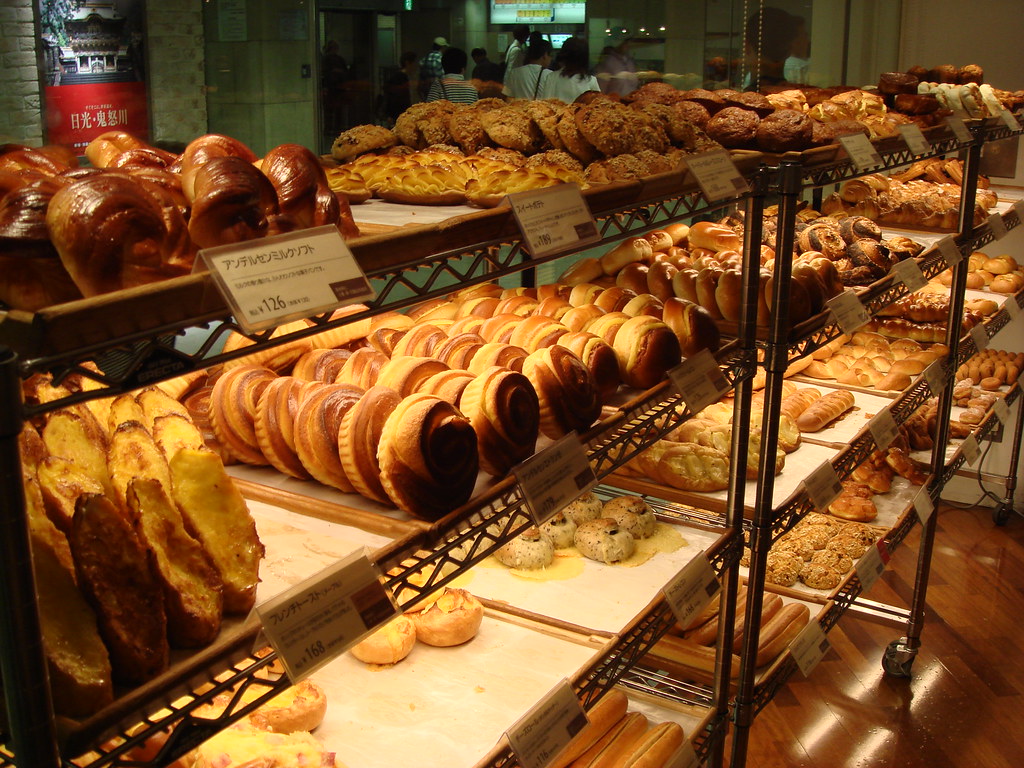 Bakery display case with pastries